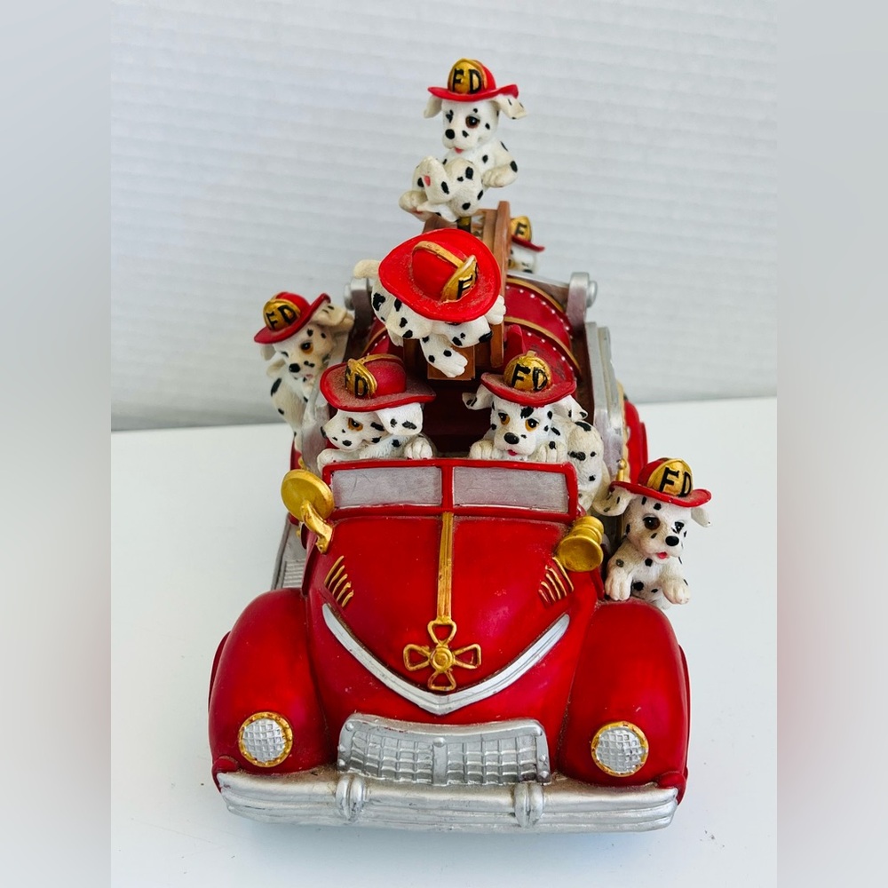 Red and White Dalmatian Car Toy Display